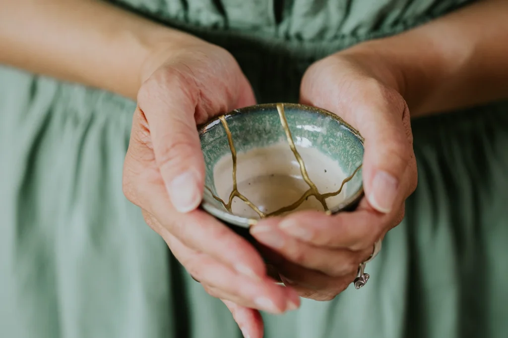 Jenn holding a kinstugi cup